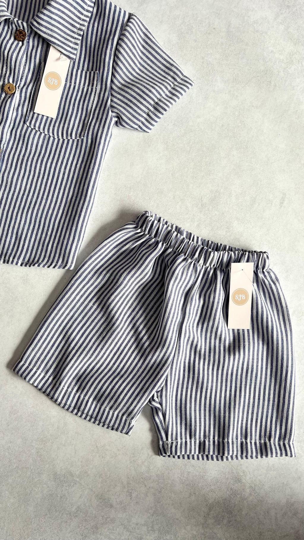 CONJUNTO RAYAS CAMISA Y SHORT