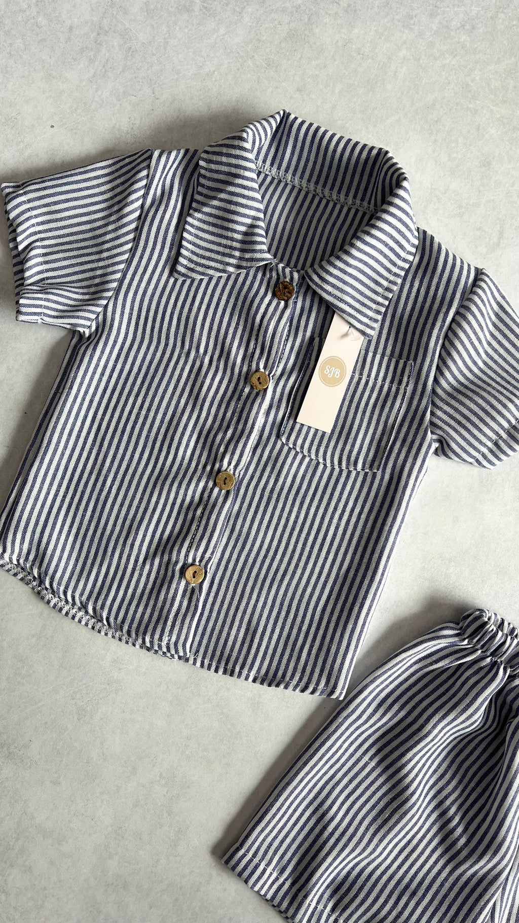 CONJUNTO RAYAS CAMISA Y SHORT