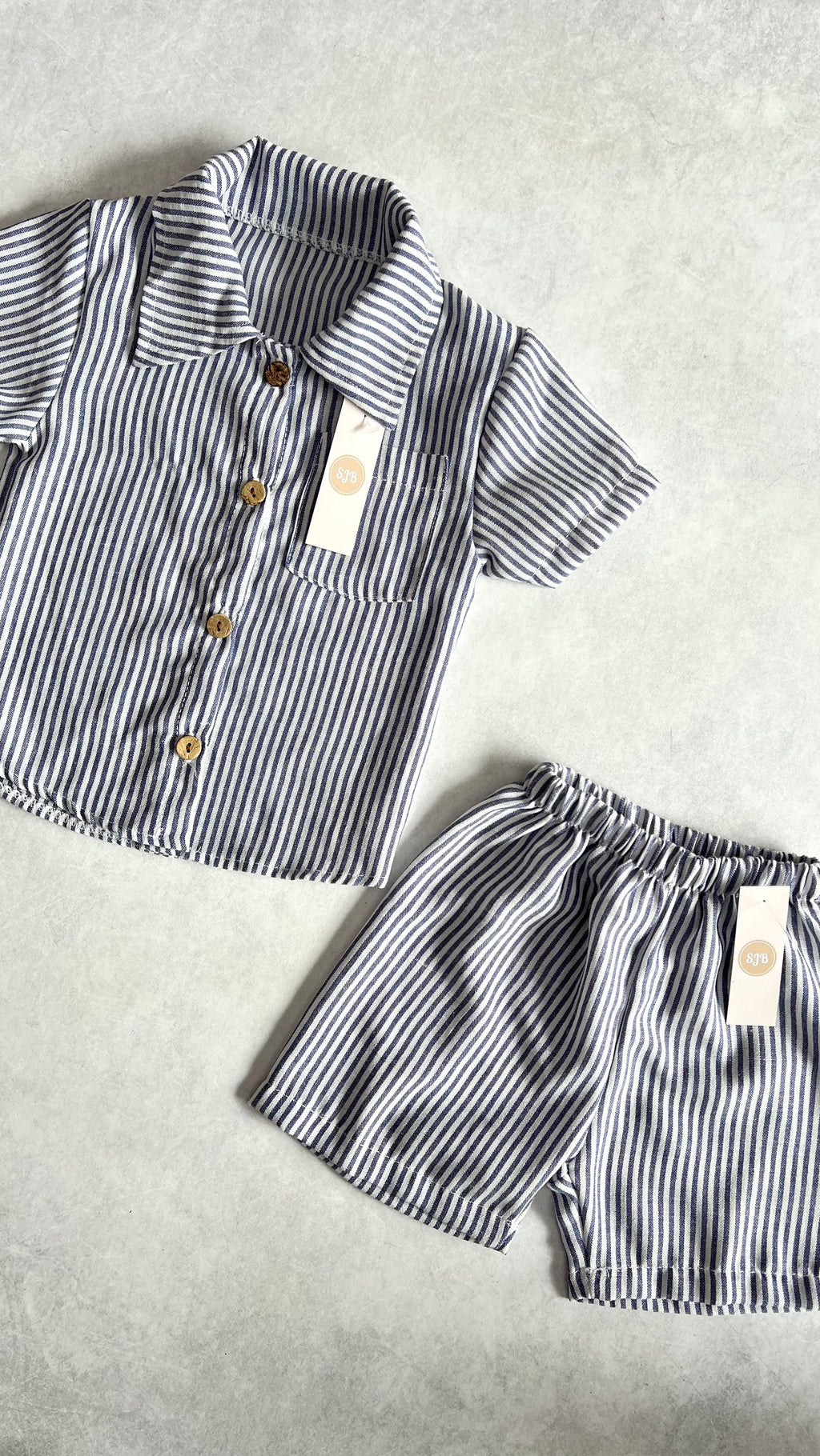CONJUNTO RAYAS CAMISA Y SHORT