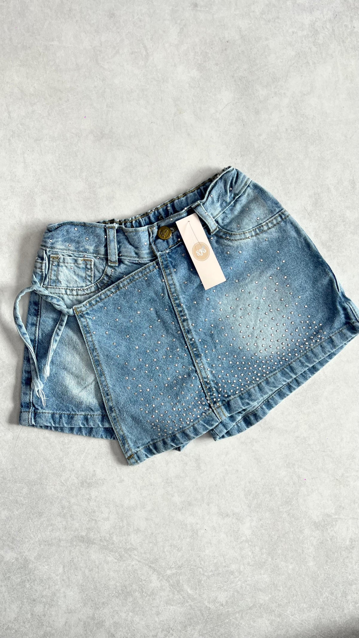 SHORT POLLERA BRILLOS